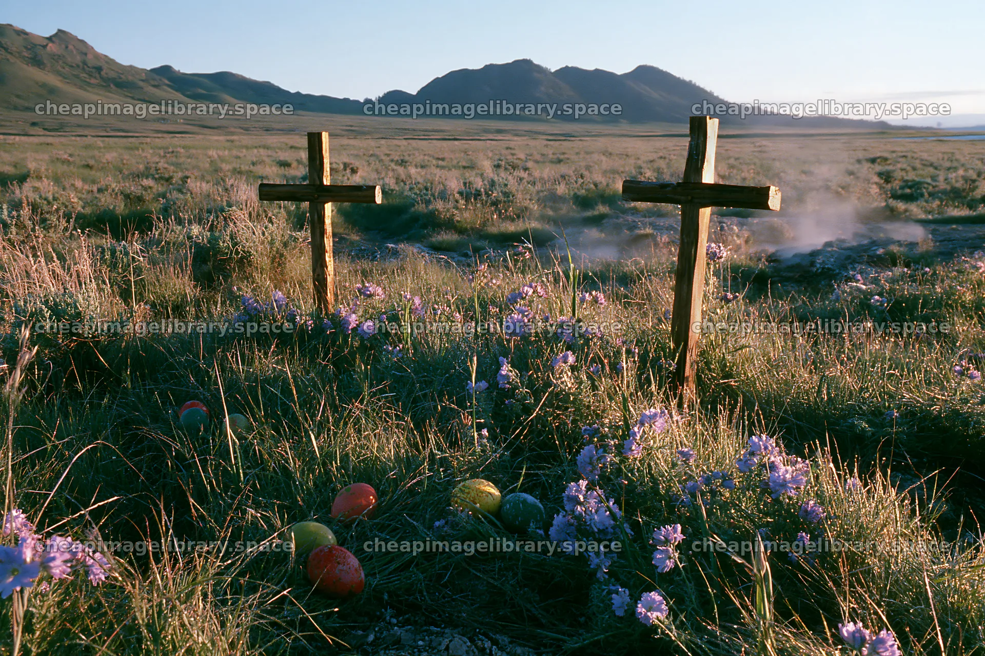 Two Christian crosses near thermal spring meadow – image library 9722x6480