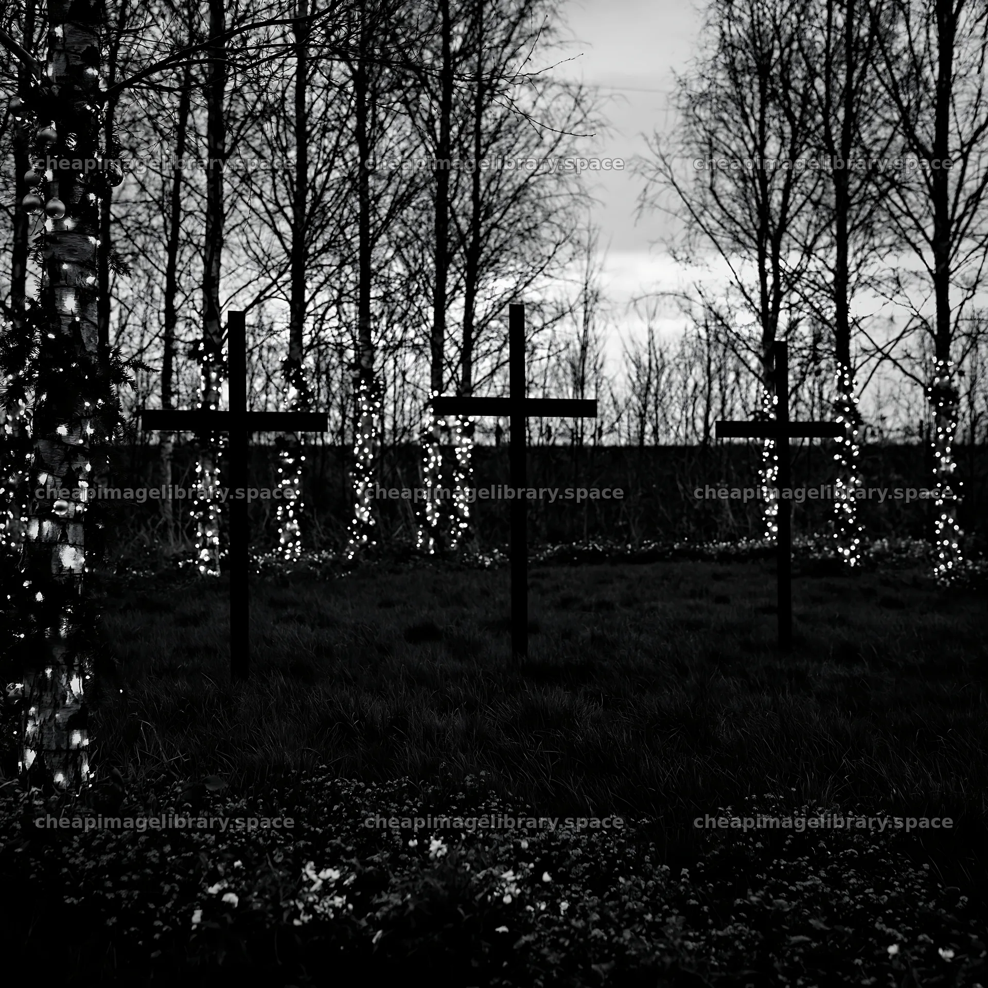 Three iron crosses in Advent meadow with lights – image library 7938x7938