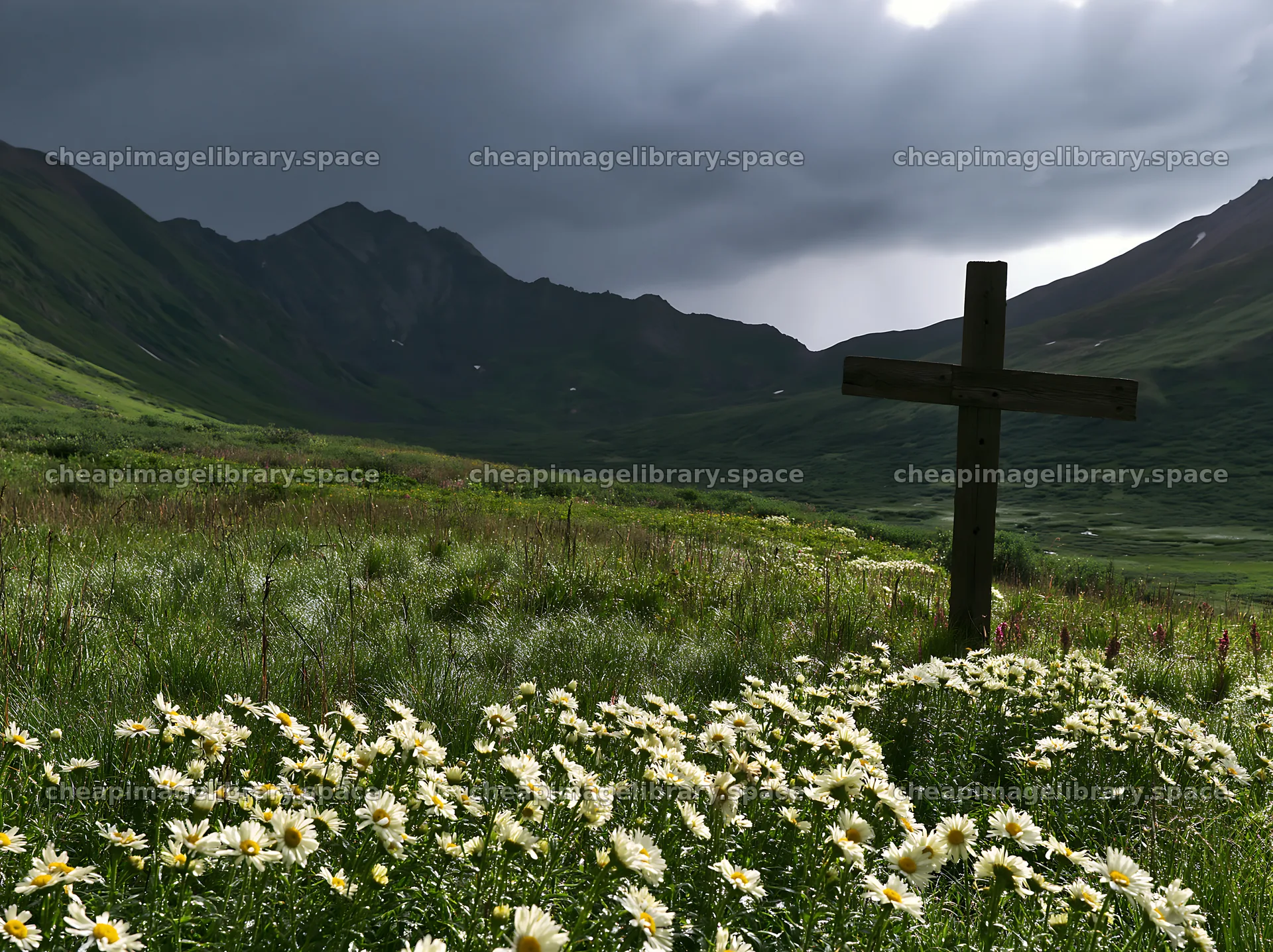 Wooden Christian cross in mountain meadow with wildflowers – image library 9174x6866