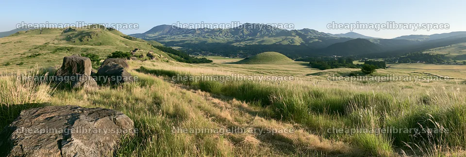 Restored Kumamoto silver grass meadow with boulders and hills – image library 13690x4602