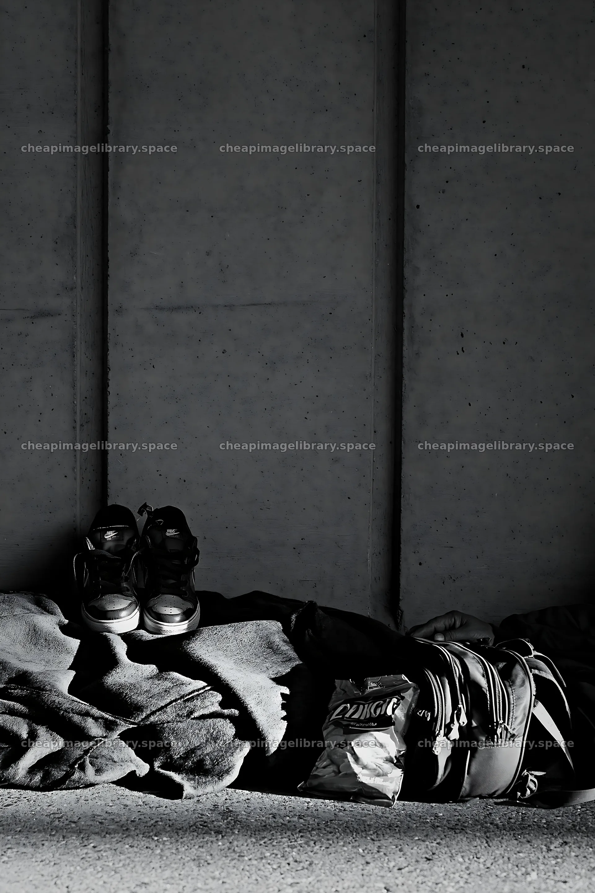 Street survival belongings against concrete wall – image library 6480x9722