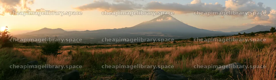 Yamanashi regenerative meadow with basalt stones at sunset – image library 14762x4268