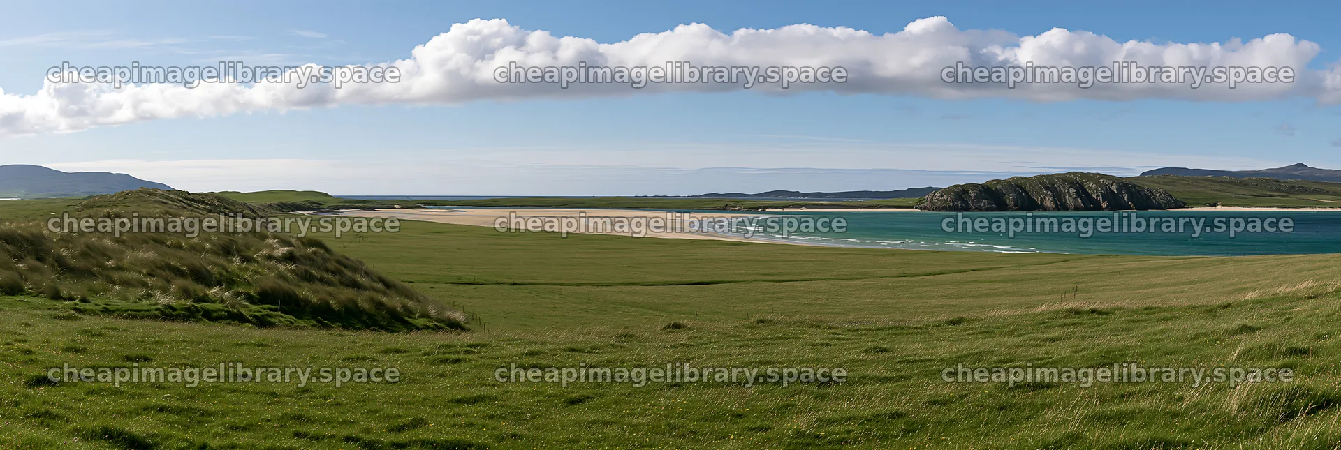 Machair beach meadow with sandy shores and blue water – image library 13690x4602