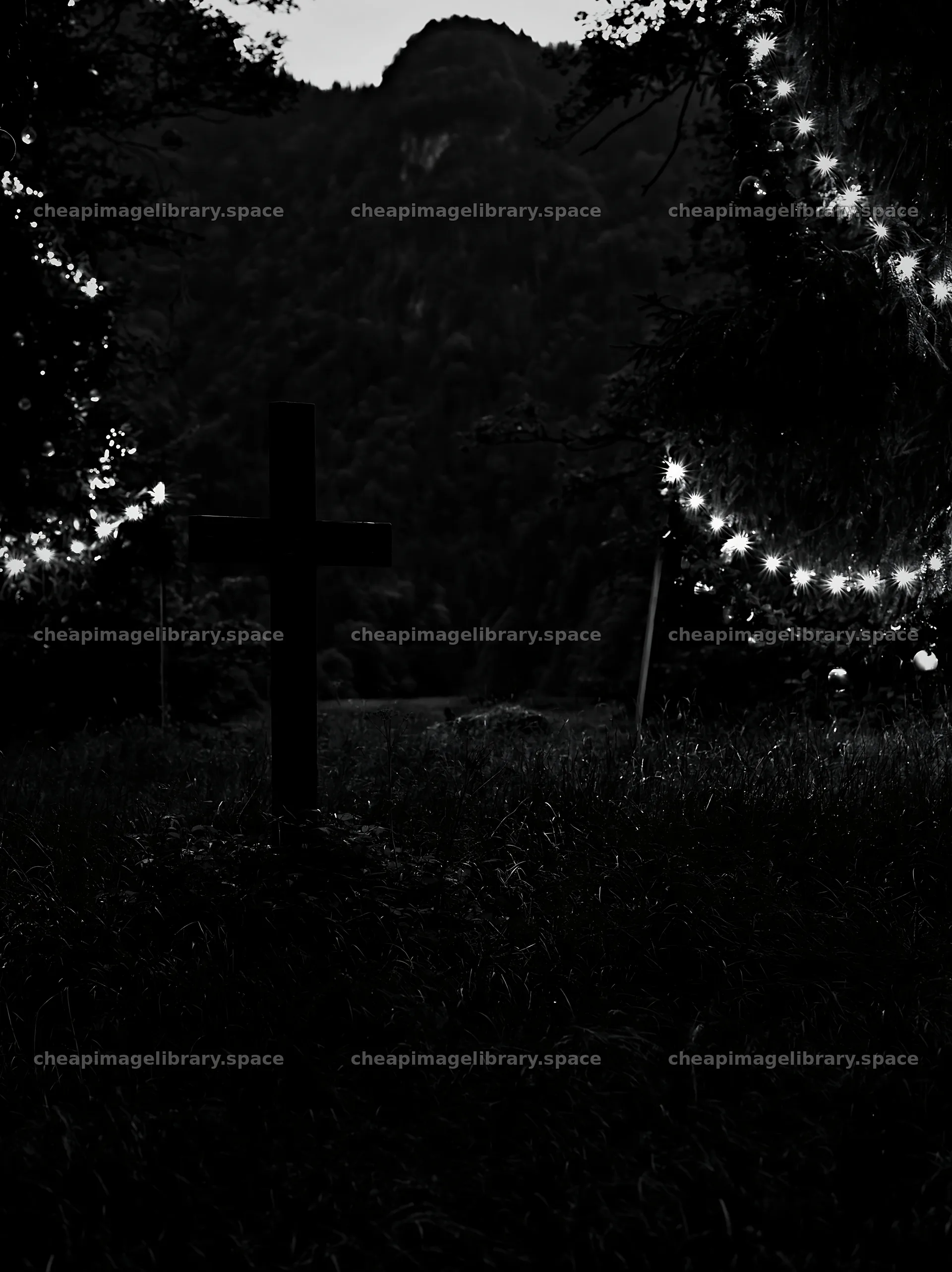 Wooden Christian cross in mountain meadow at night – image library 6866x9174