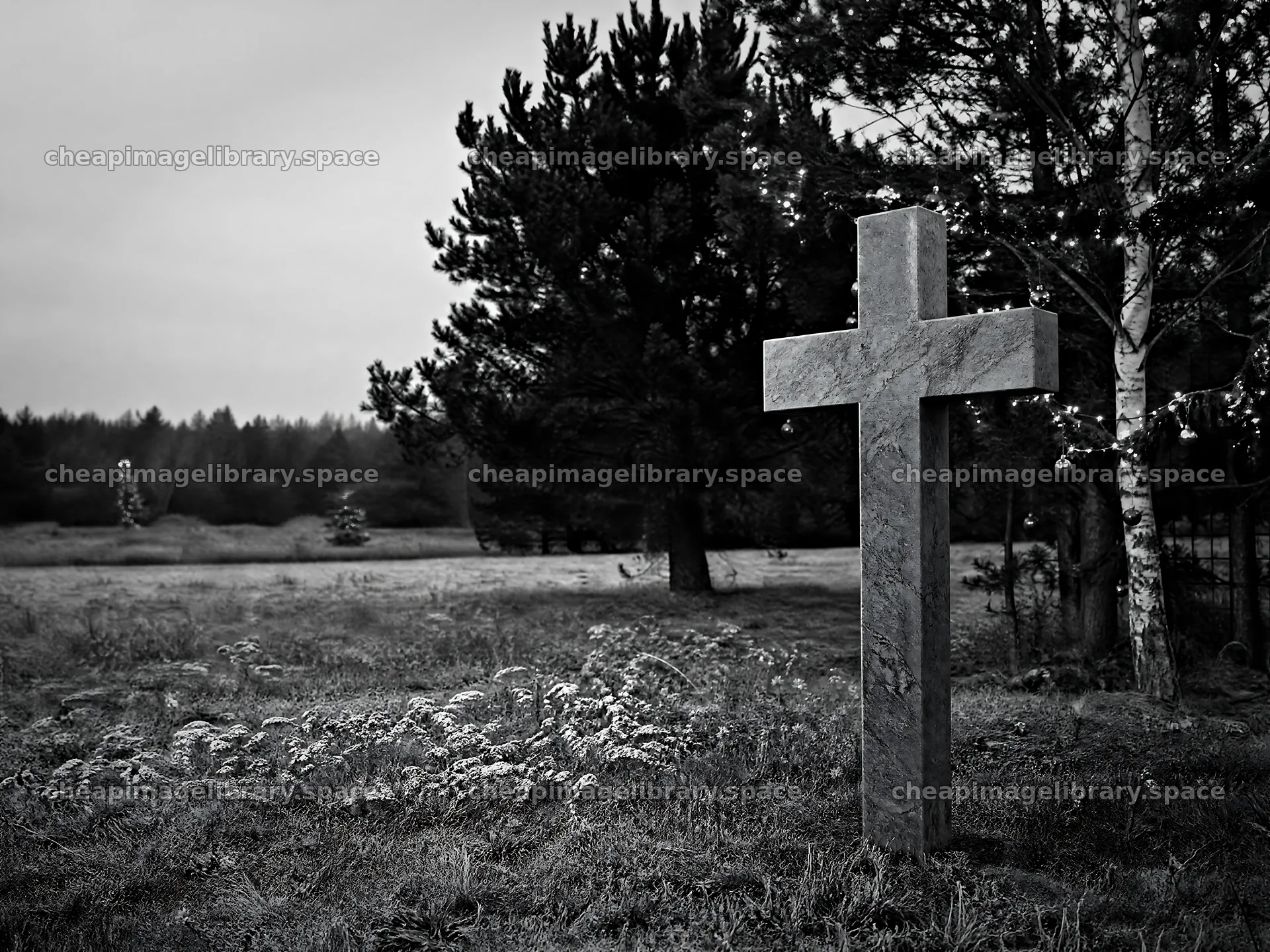 Marble Christian cross in quiet meadow at hot springs – image library 9166x6874