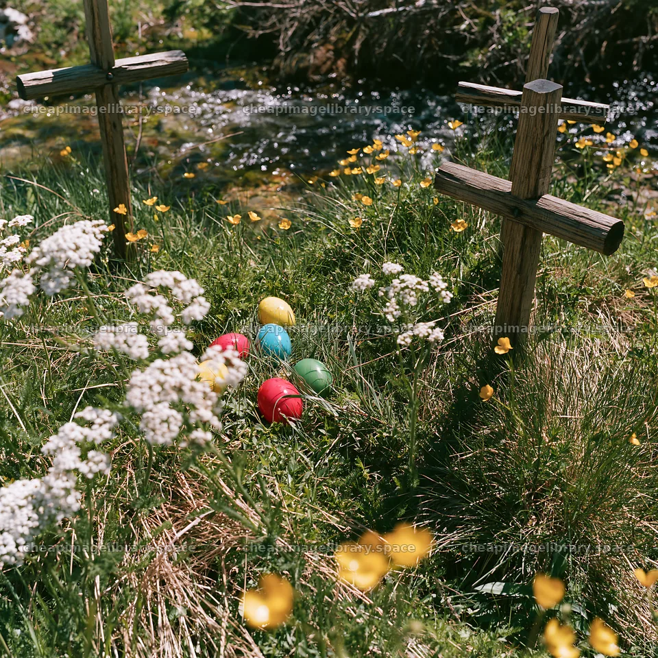 Christian crosses by mineral spring meadow with colored eggs – image library 7938x7938