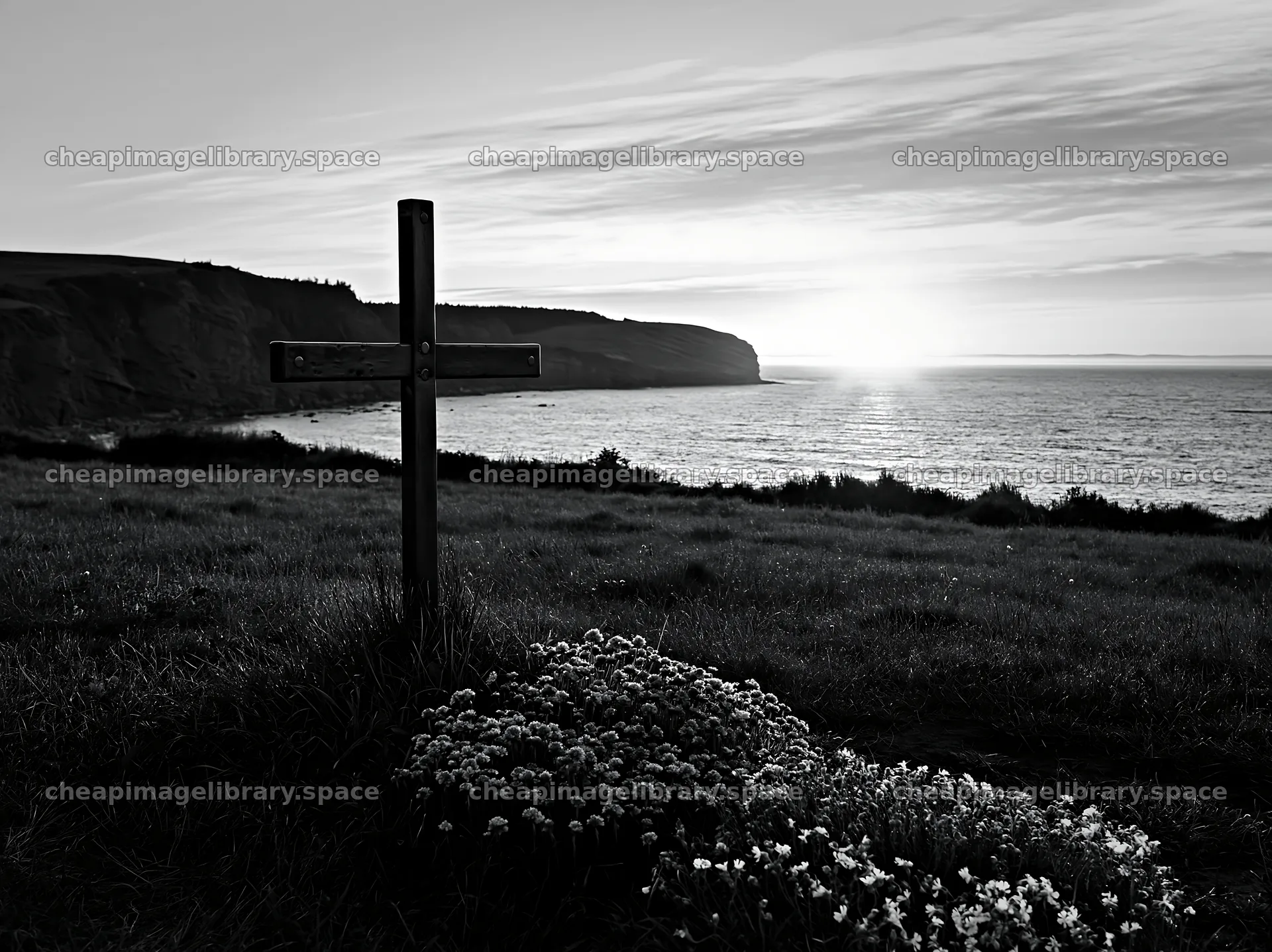 Christian cross at sunrise over meadow by the sea – image library 9174x6866