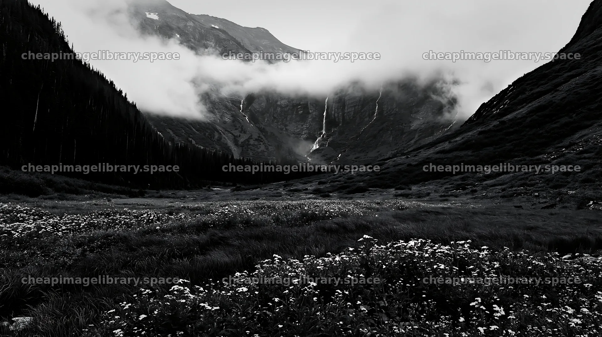 Misty mountain waterfall in meadow landscape with clouds – image library 10608x5938